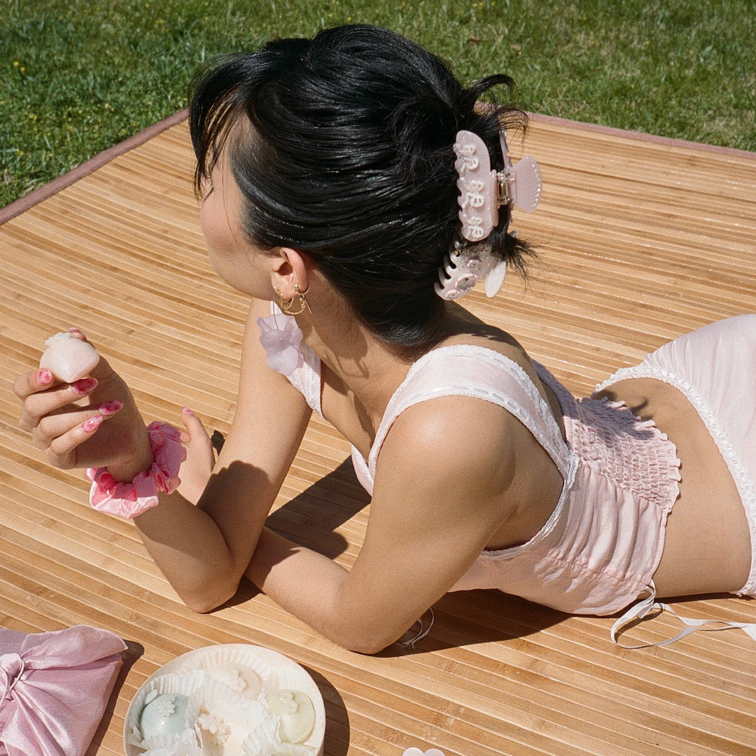 Model wearing Sweetheart Clip in Pink Pixie