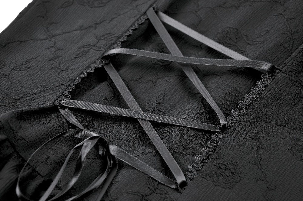 Lace-up corset back detail of the Black Gothic Halter Mini Dress with Tiered Ruffles showcasing elegant black ribbons.