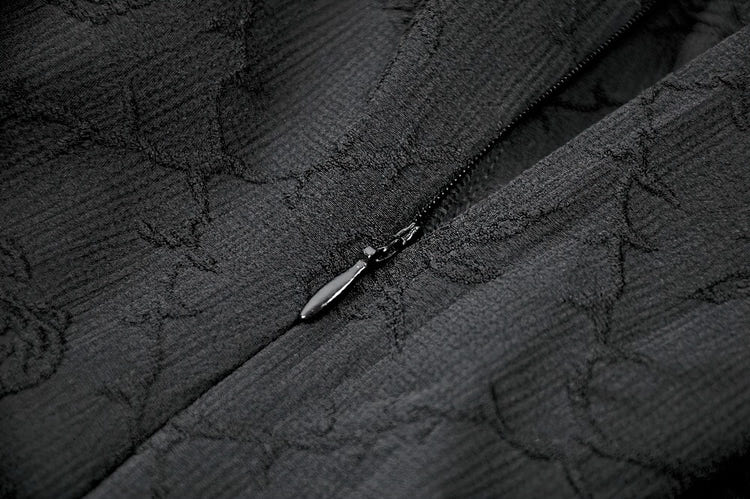 Black Gothic Halter Mini Dress with Tiered Ruffles close-up of textured fabric and zipper detail.