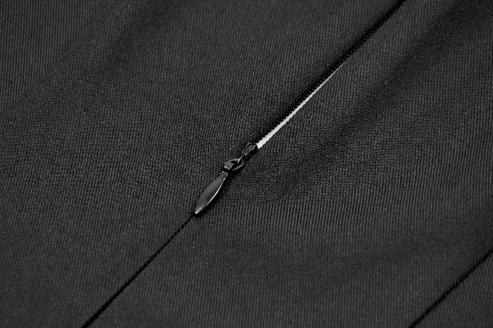 Close-up of the zipper detail on the Black Gothic Sleeveless Mini Dress with Lace-Up Waist.