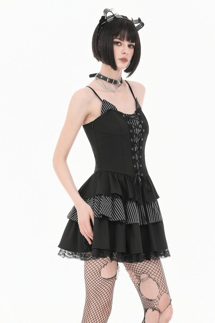Black Punk Striped Mini Dress with Lace-Up Bodice worn by a model featuring ruffles and a lace-up design.