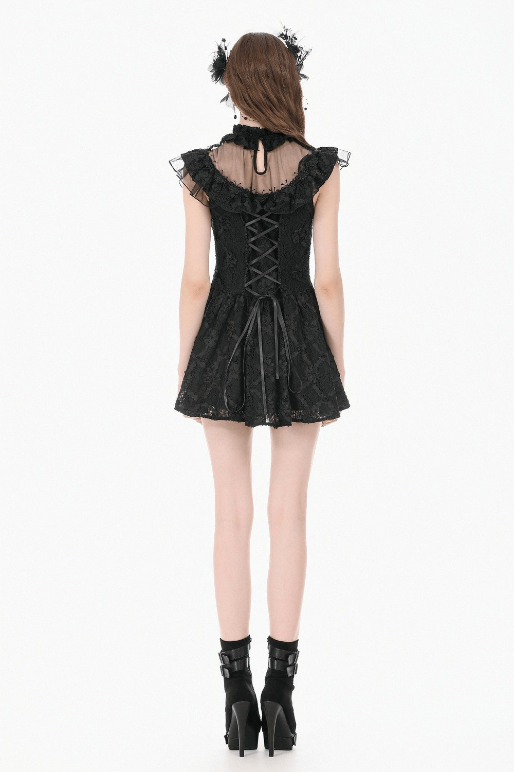Back view of Dark Romantic Lace Mini Dress with Corset Waist and Cross showcasing lace details and corset lacing.