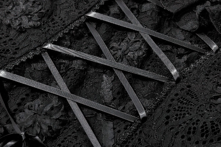 Close-up of the Dark Romantic Lace Mini Dress with Corset Waist and Cross featuring detailed floral lace and ribbon lacing.