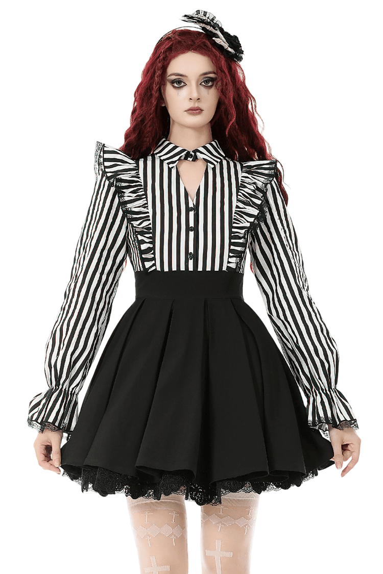 Elegant Striped Dress with Ruffle Sleeves and Moon Detail - image 1