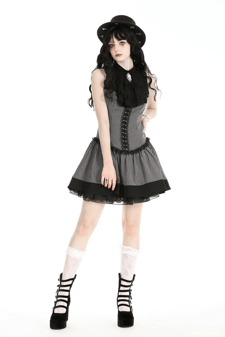 Elegant Striped Ruffle Dress with Brooch Accent - image 12
