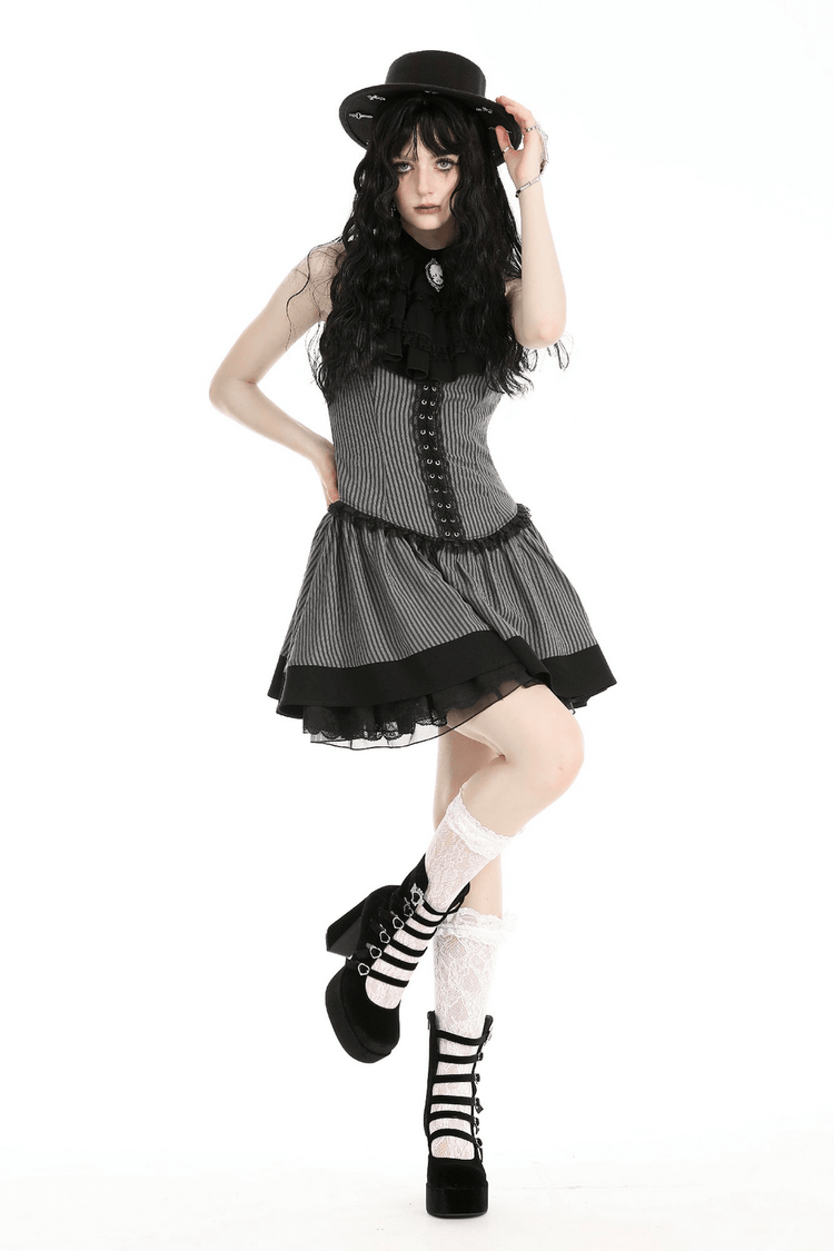 Elegant Striped Ruffle Dress with Brooch Accent - image 15