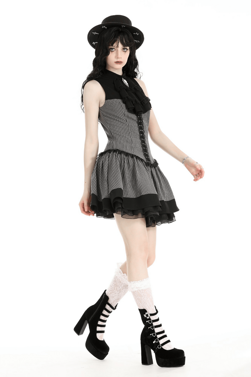 Elegant Striped Ruffle Dress with Brooch Accent - image 13