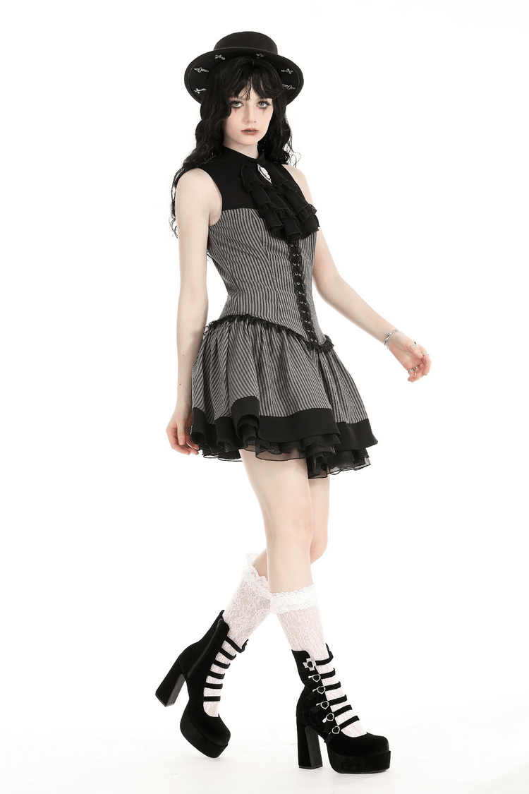 Elegant Striped Ruffle Dress with Brooch Accent - image 13
