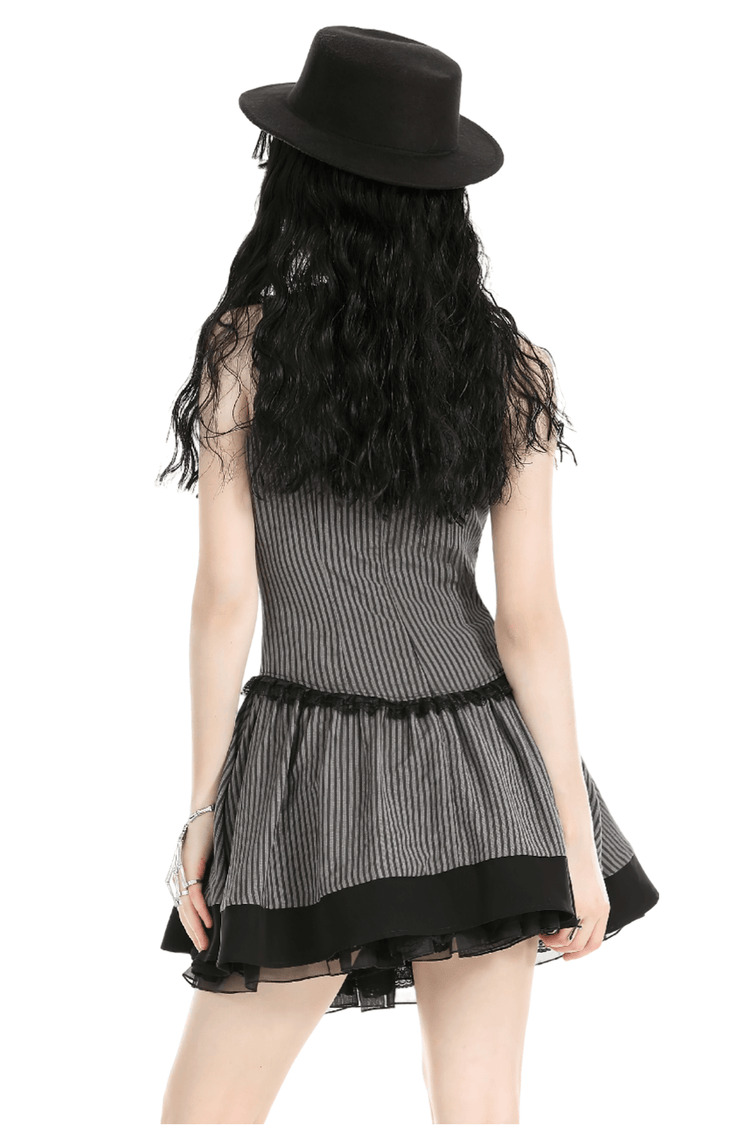 Elegant Striped Ruffle Dress with Brooch Accent - image 2