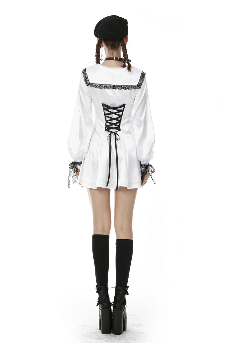 Elegant White Satin Dress with Black Lace Detailing - image 2