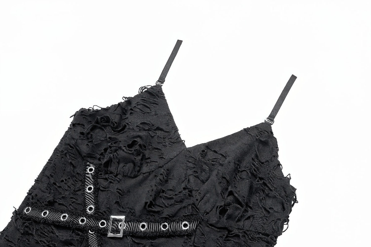 Close-up of the shredded texture and metal eyelet details.