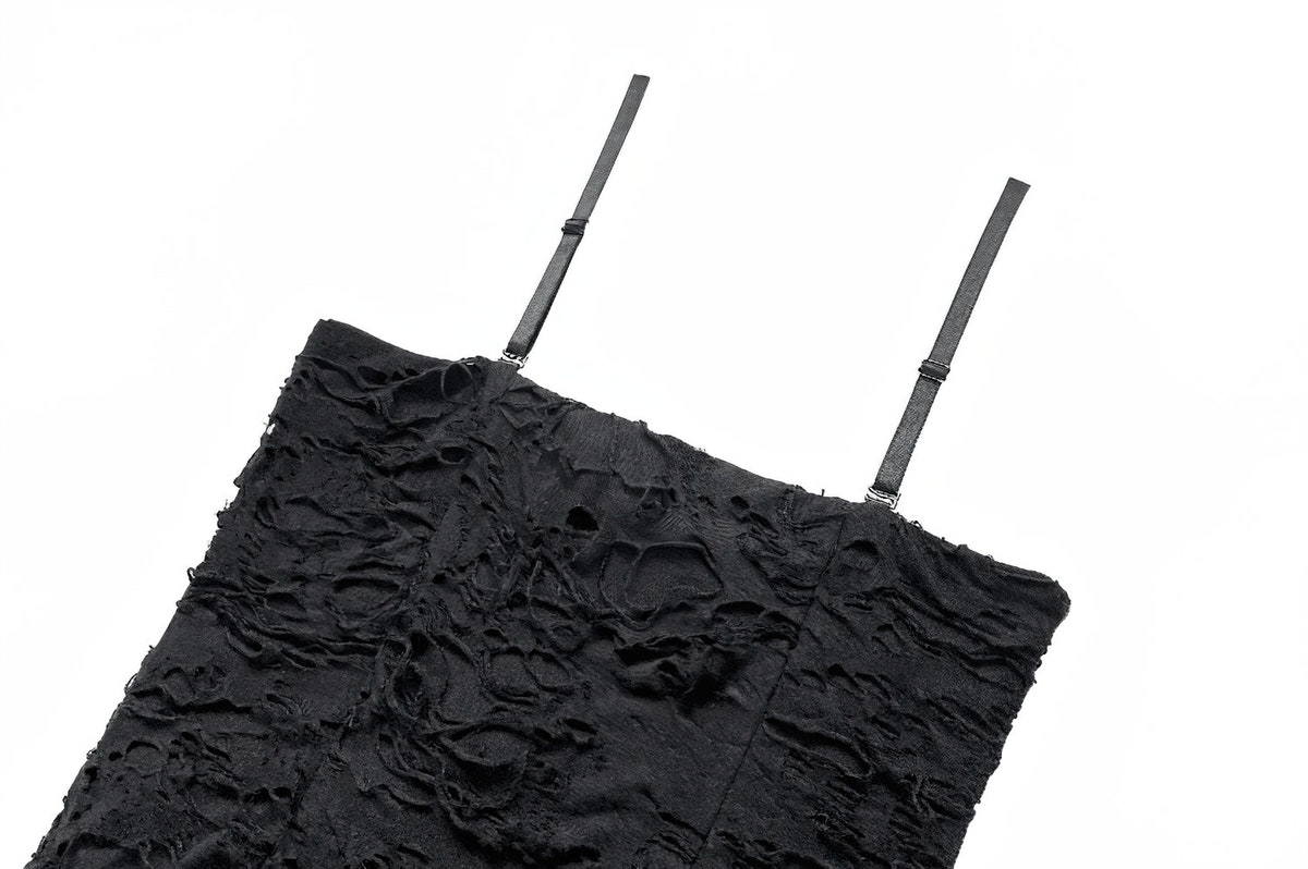 Close-up of the textured black fabric and adjustable straps.