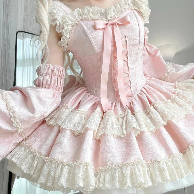 Pink dress gathered waist and cream lace ruffle tiers