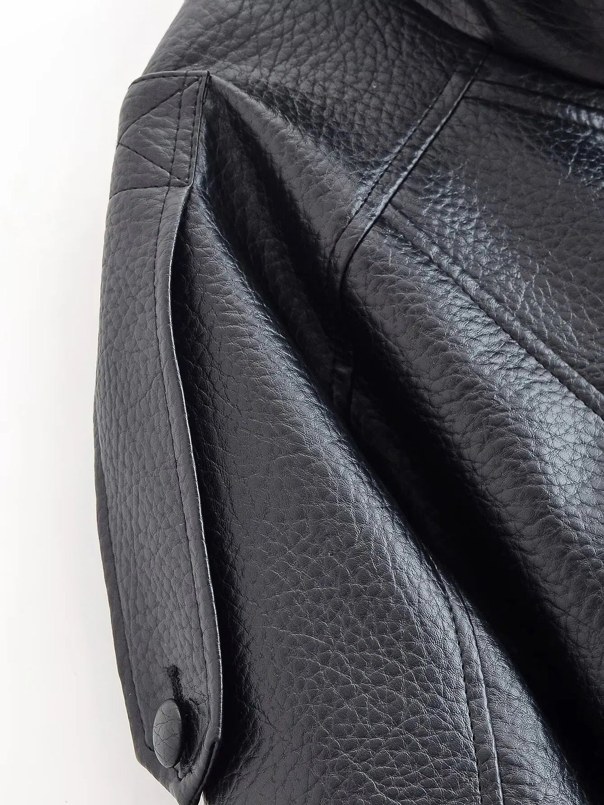 Black vegan leather jacket layered outfit
