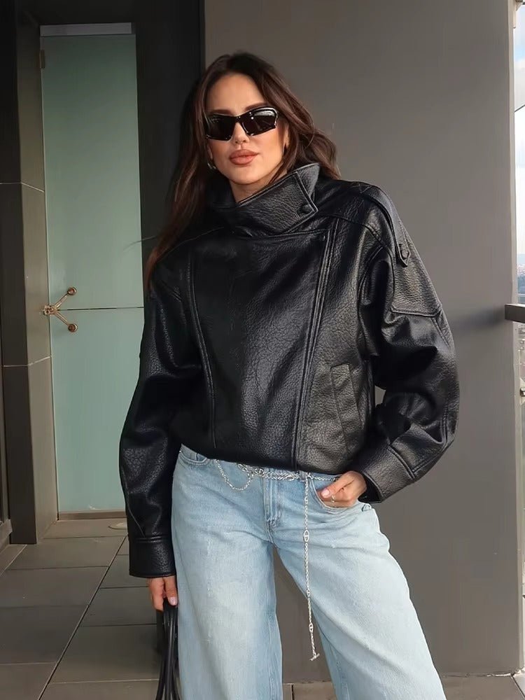 Black asymmetrical zip jacket close-up