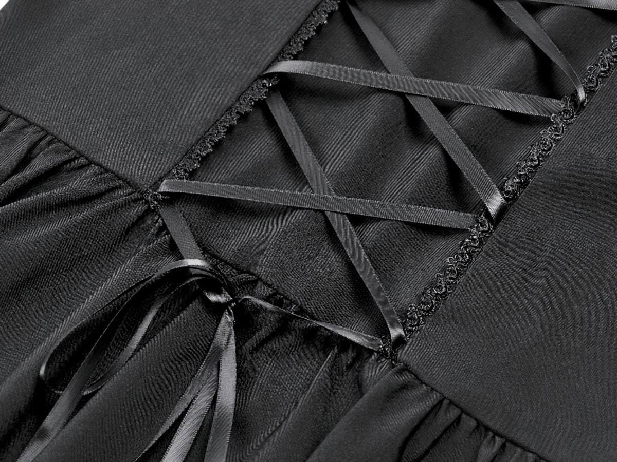 Close-up of the lace-up back detail on the Women's Gothic Cold Shoulder Mini Dress with Lace Sleeves.