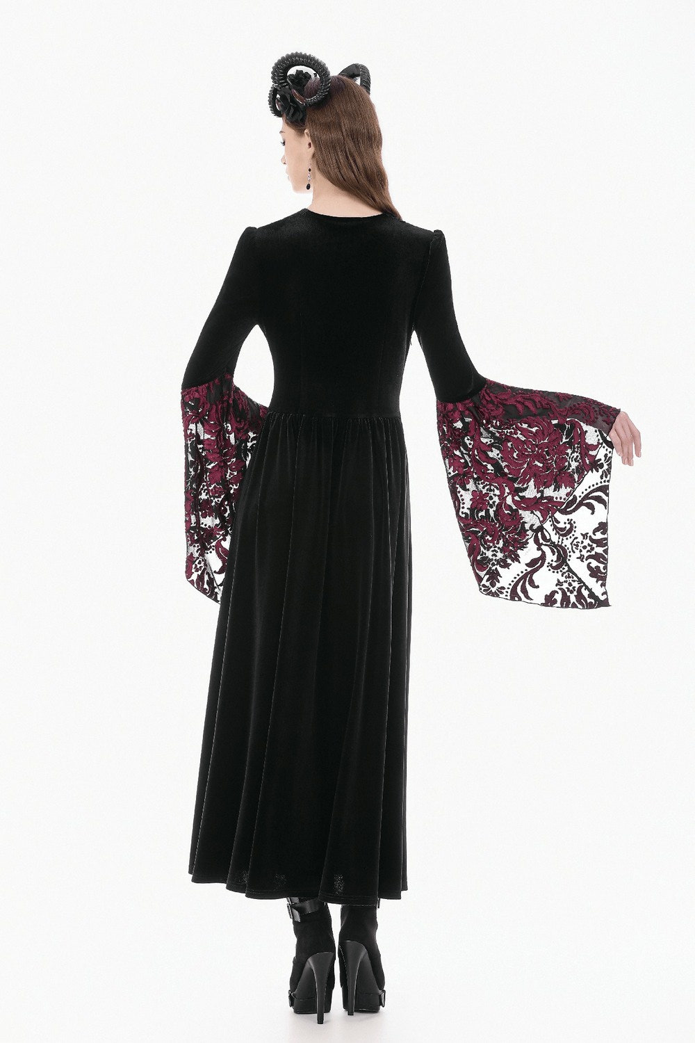 Back view of Women's Gothic Velvet Maxi Dress with Lace Bell Sleeves showcasing lace details and a flowing skirt.